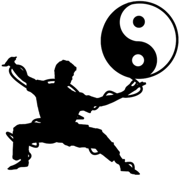 chi energy flowing around a silhouetted man with a yin-yang ball