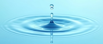 A drop of water in a body of water.